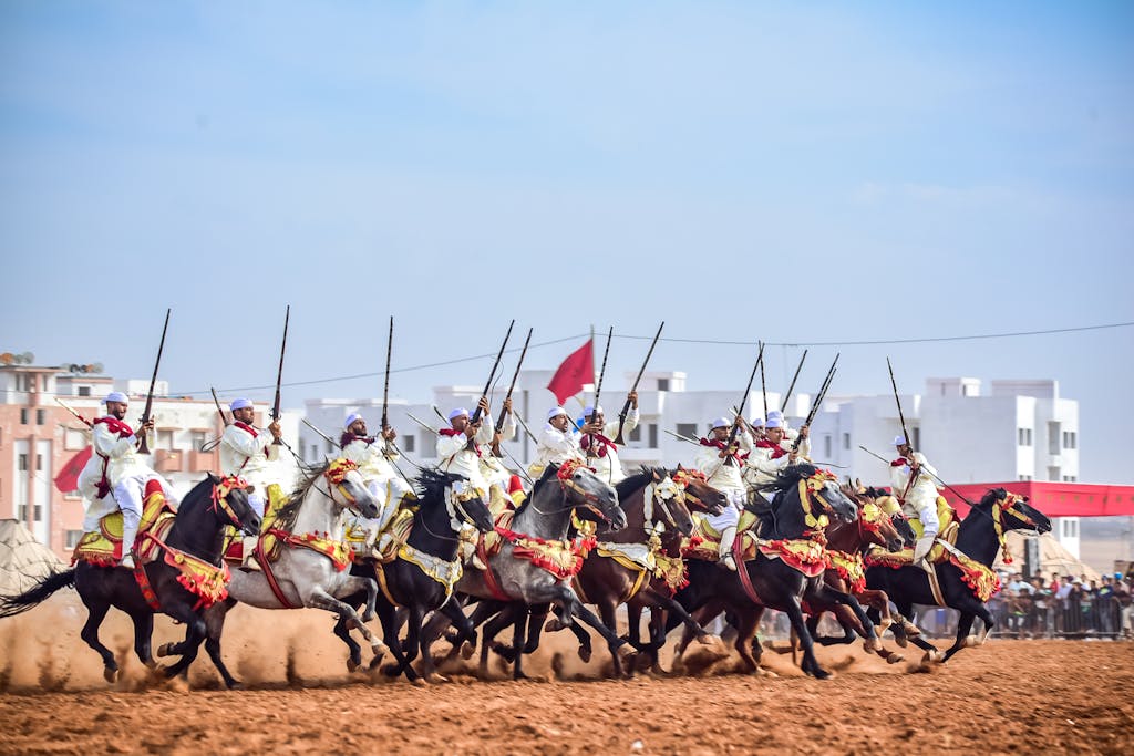 Spectacular display of Moroccan Fantasia with riders and horses in Ain El Aouda.